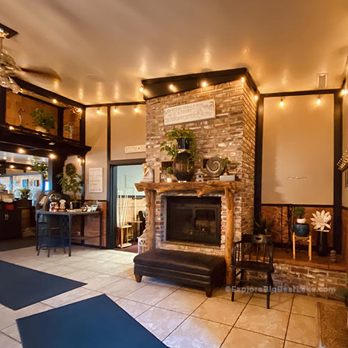 Santana and mavericks lakeside restaurant review_Image of inside with firreplace and gameroom_copyright_ExploreBigBearLake_dot_com